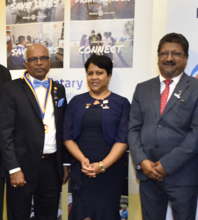 Maria Mohammed-Maharaj pictured with Rotary Club of St Augustine leaders in the Trinidad Express article St Augustine Rotary marks 51 years
